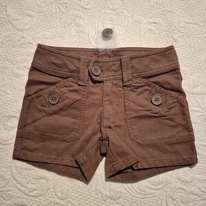 So girls size 7 medium brown shorts, 4 buttoned pockets NWOT